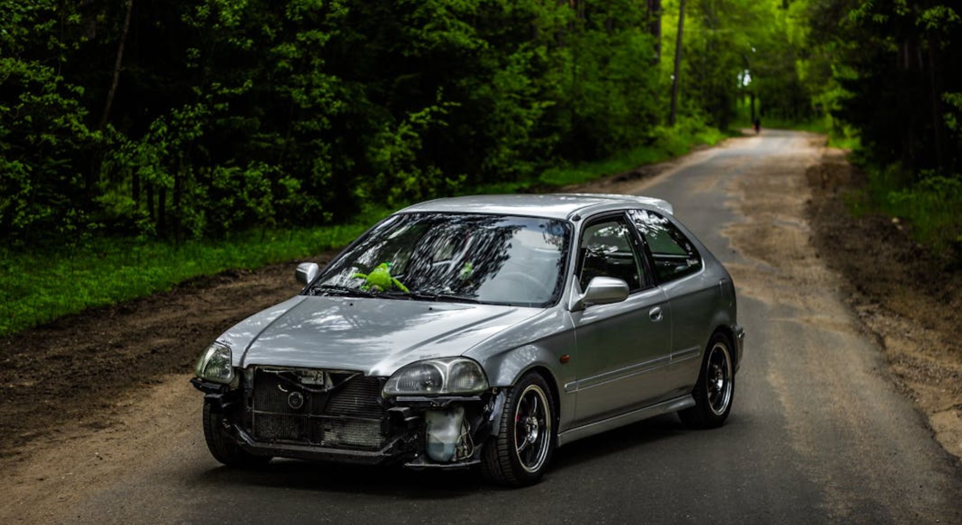 Damaged car on the road