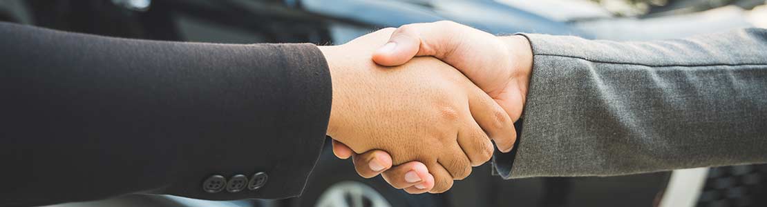 Handshake on car sale