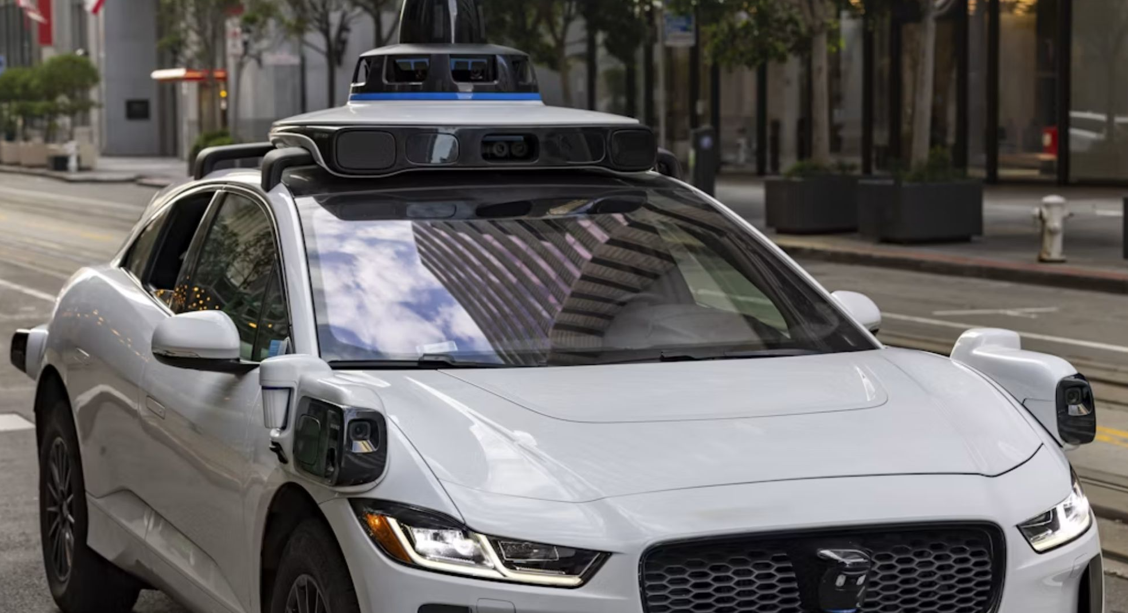 white self driving car